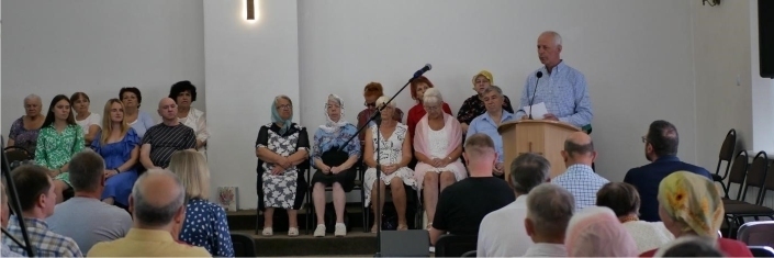 Group of Ukrainian believers meeting in church