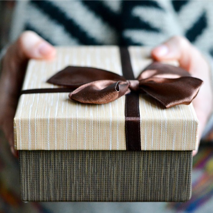 wrapped present with a brown bow