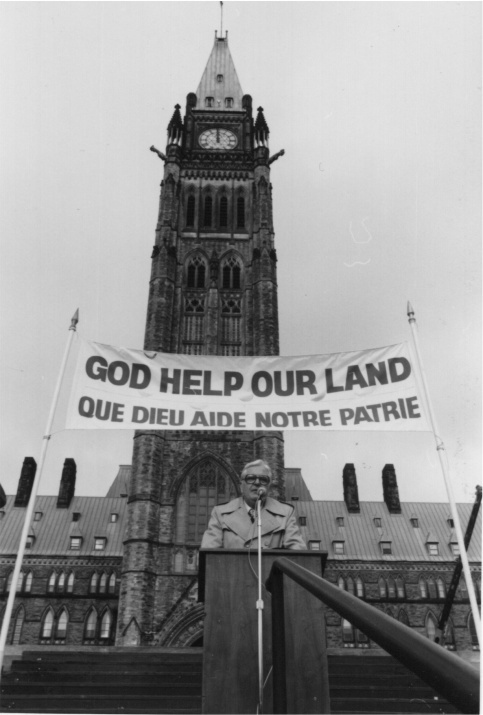 Peace tower in Ottawa with Dr. Jack Scott praying for Canada Oct 231980